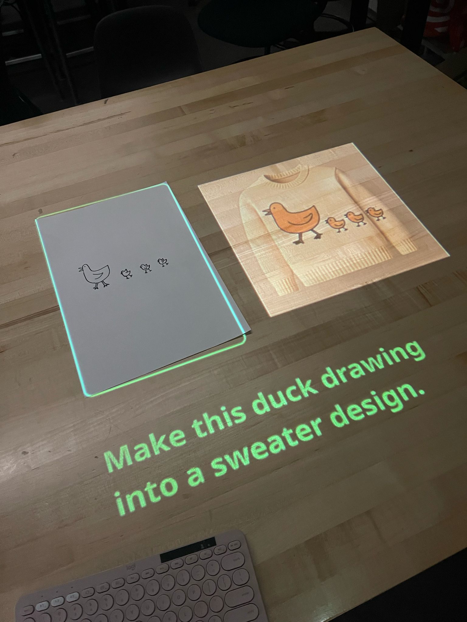 Turning a hand-drawn sketch into a generated product design, projected onto the table.